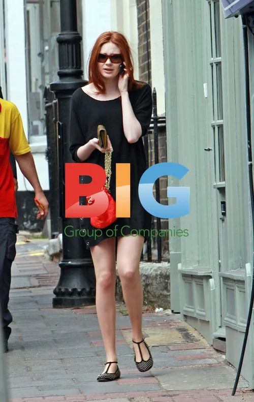 Karen Gillan battling wind in London