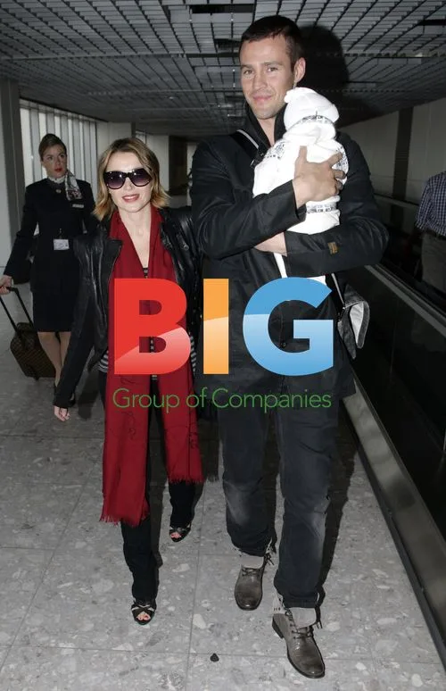 Dannii Minogue and Family Arrive in London