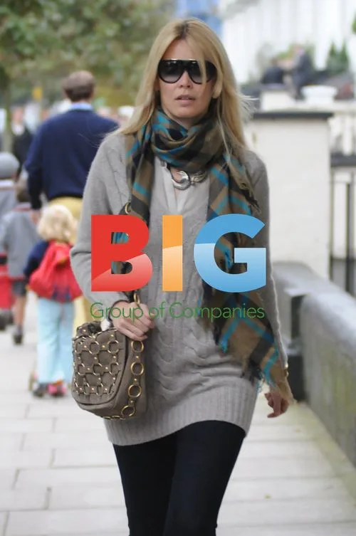 Claudia Schiffer on school run in London