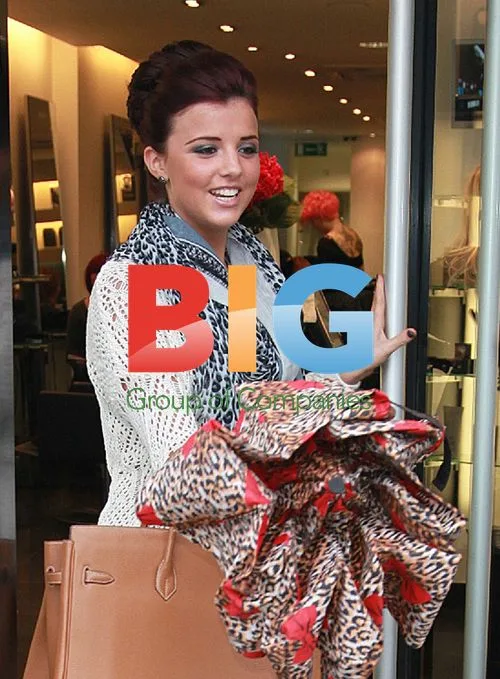 Lucy Meck texting at salon