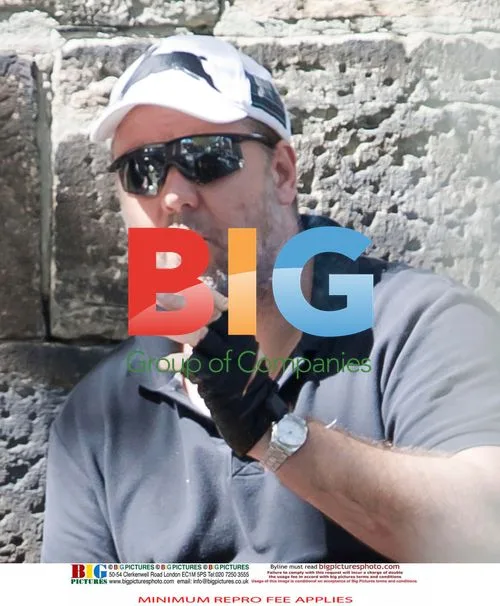 Russell Crowe Takes Cigarette Break