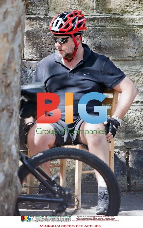 Russell Crowe Takes Smoke Break and Bikes