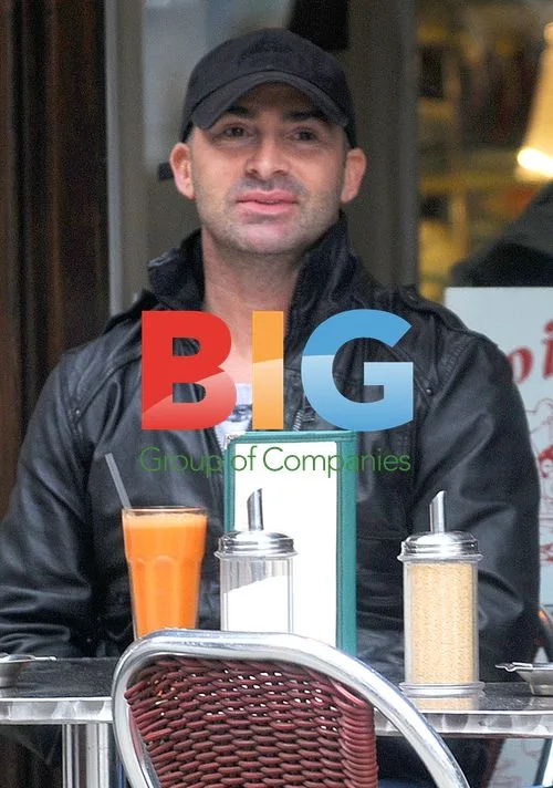 Louie Spence having coffee in Soho