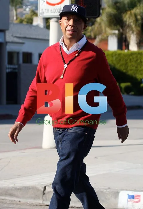 Russell Simmons with brunette in LA