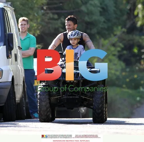 Peter Andre and son Junior on quad bike