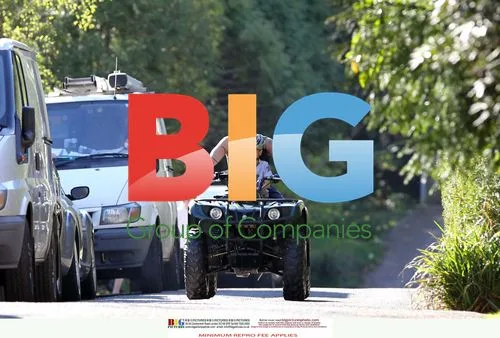 Peter Andre and son ride quad bike