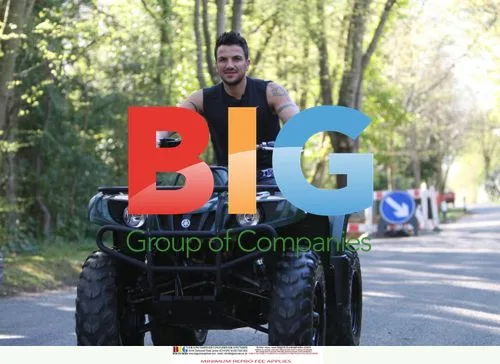 Peter Andre and son on quad bike