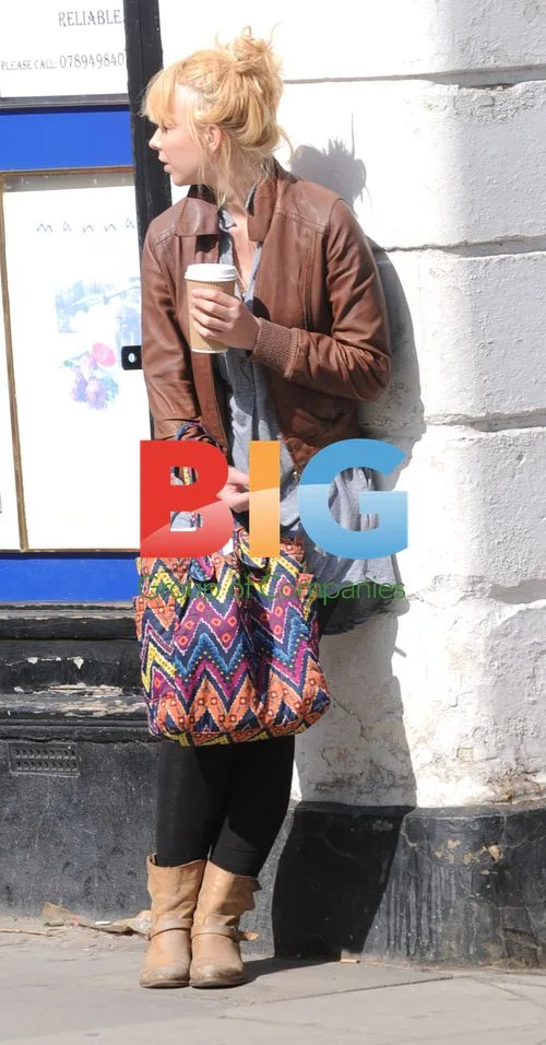 Ronnie Wood's girlfriend Ekaterina Ivanova smoking in London