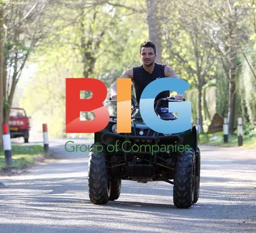 Peter Andre and son ride quad bike
