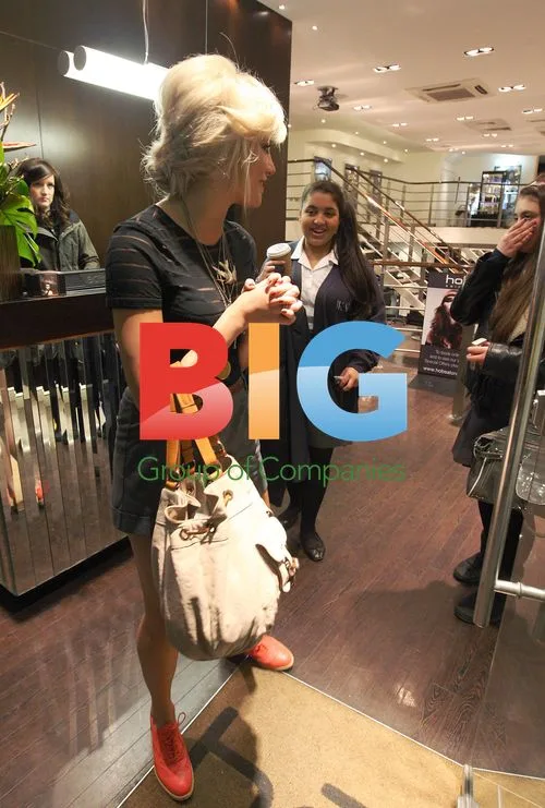Pixie Lott Connects with Fans at London Salon