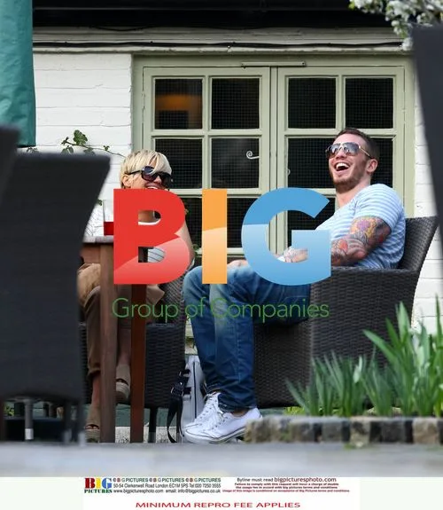 Kerry Katona and boyfriend Dan Foden at a pub