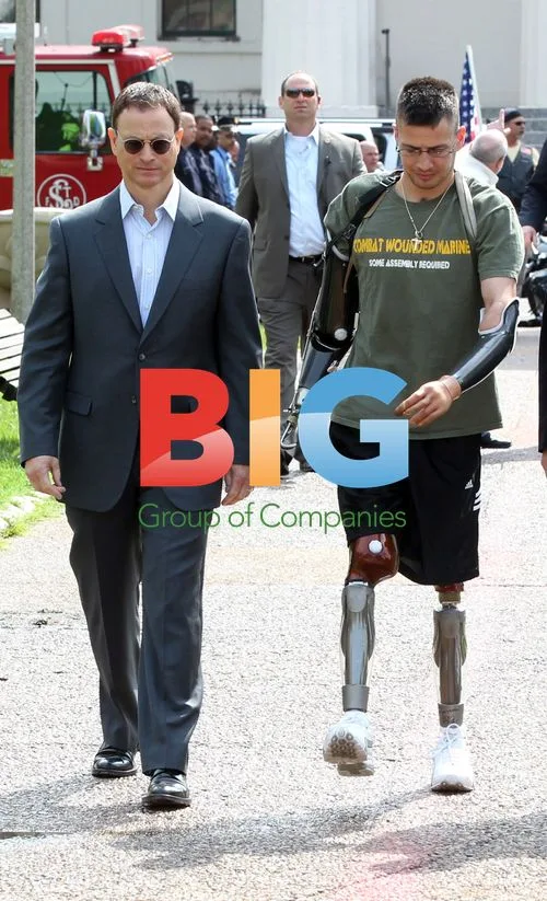 Gary Sinise Stands with Marine Corporal Todd Nicely