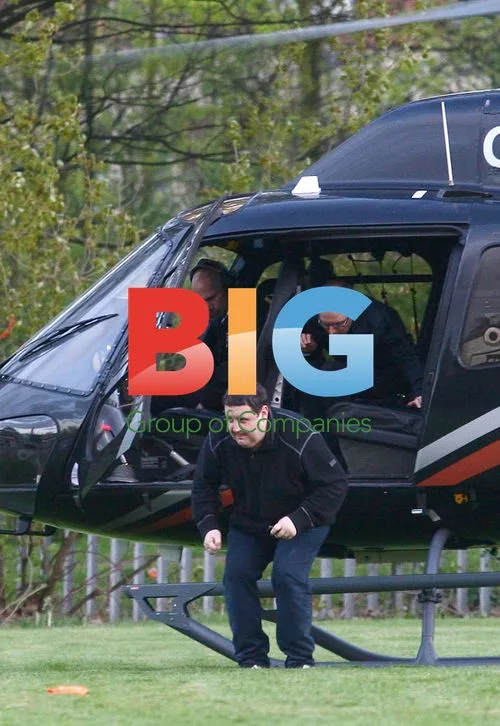 Comedian Peter Kay Arrives by Helicopter