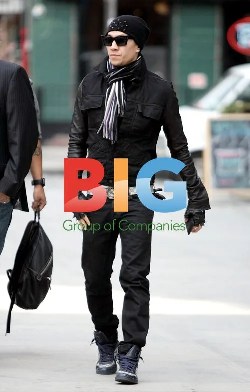 Black Eyed Peas members Taboo and Will.I.am leave hotel