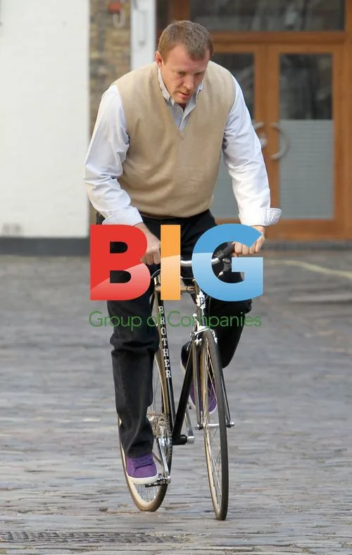 Guy Ritchie Spotted on Bike in London