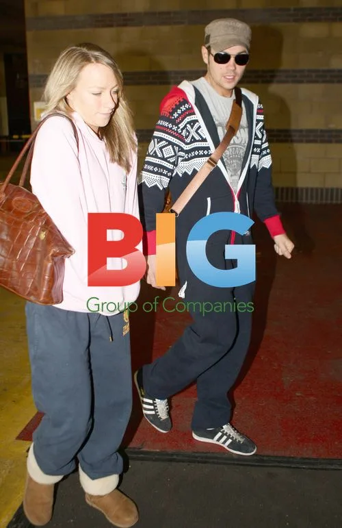 Chloe Madeley and Sam Attwater take a smoke break