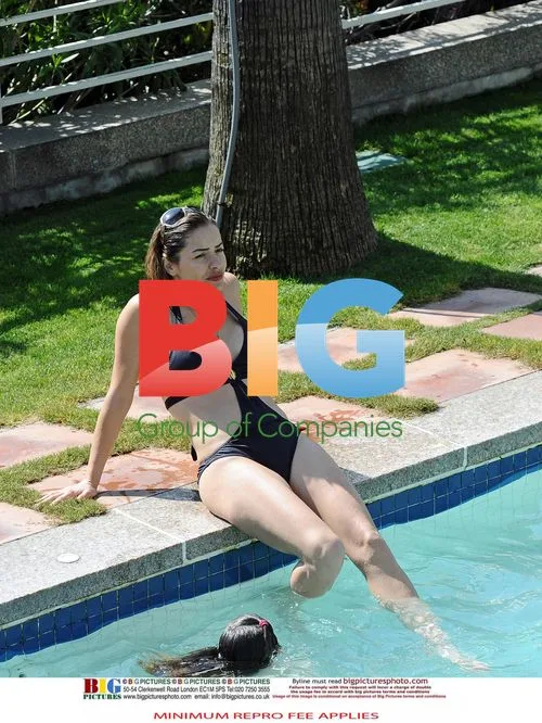 Elen Rivas Relaxes by Pool in Barcelona
