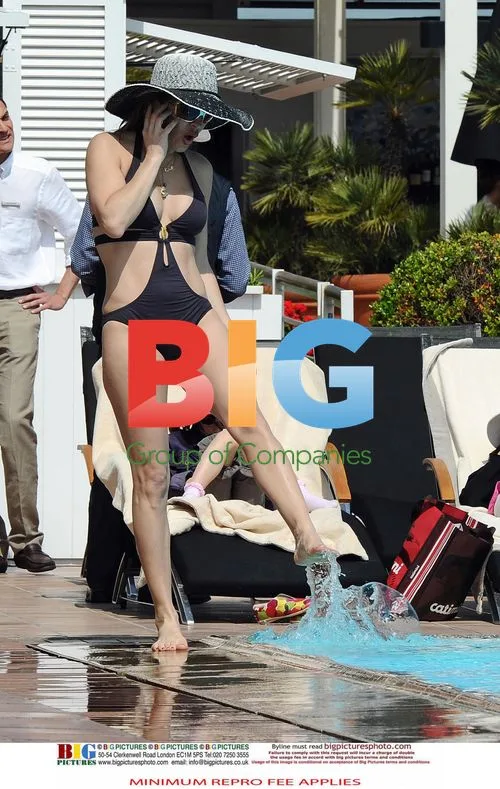Elen Rivas Relaxes by Pool in Barcelona