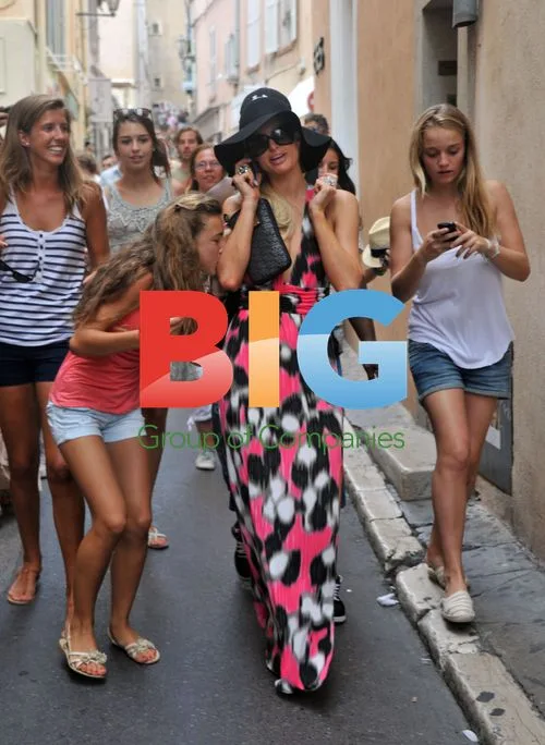 Paris & Nicky Hilton Mobbed by Fans in Saint Tropez