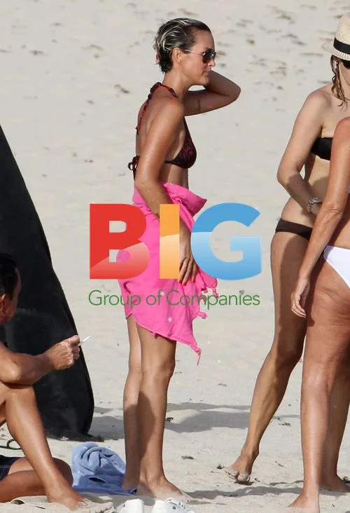 Laeticia Hallyday on Beach Vacation