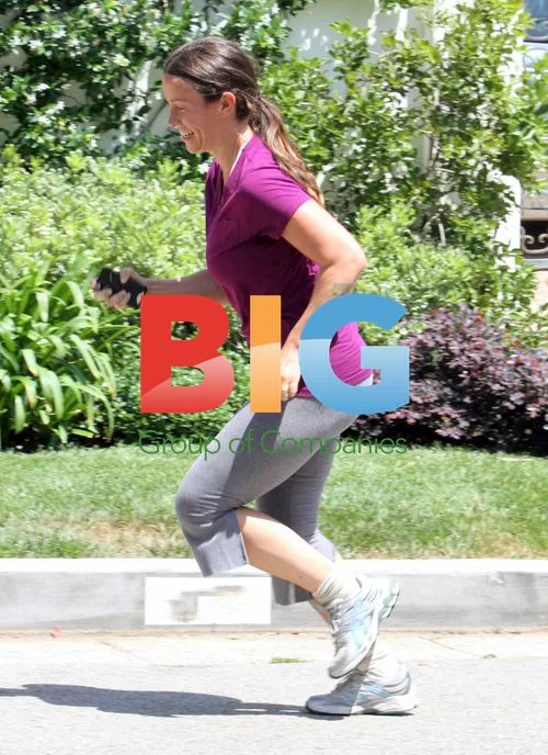Alanis Morissette Running with Friend