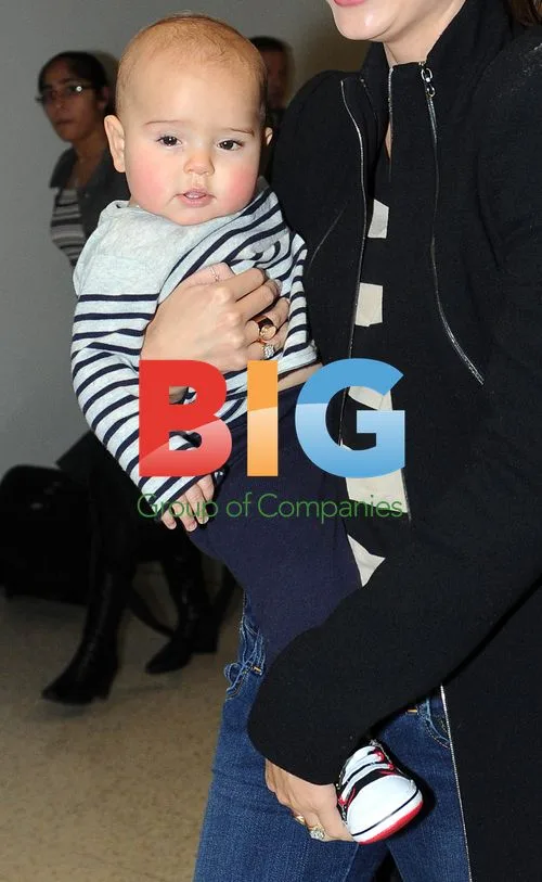 Miranda Kerr and son Flynn arrive at Melbourne Airport