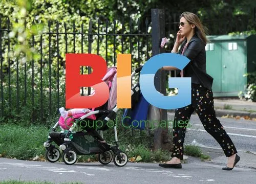 Rachel Stevens Strolling with Baby in London