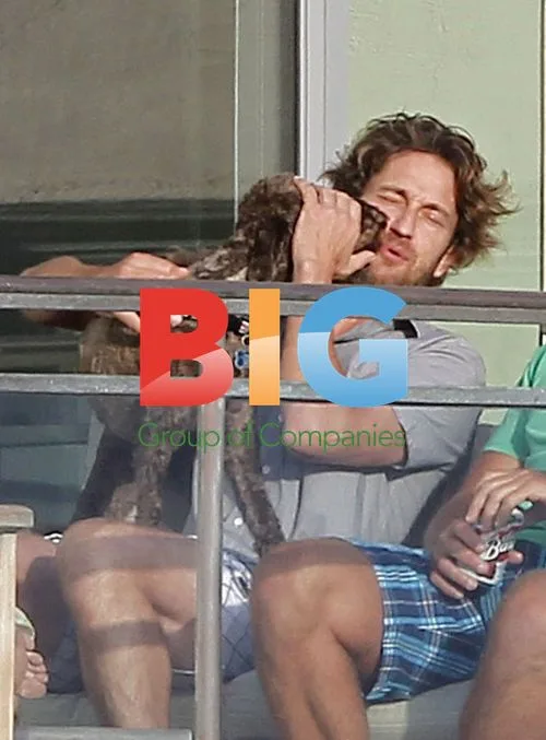 Gerard Butler and Furry Friend in Malibu