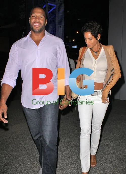 Nicole Murphy and Michael Strahan