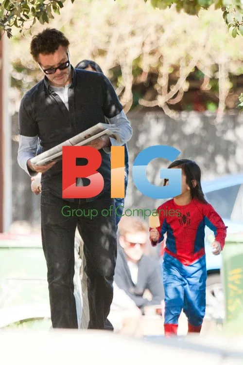 Paul McDermott with son Xavier and partner Melissa Lyne