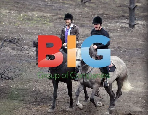 Snow White film set with actors riding horses
