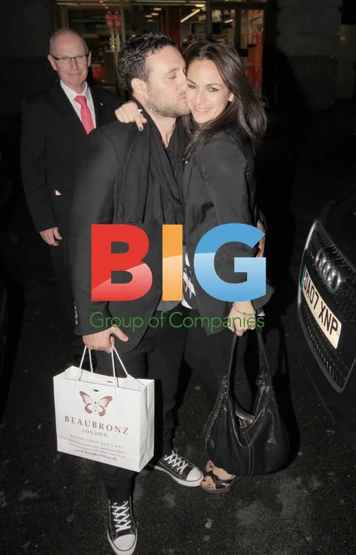 Blue singer Antony Costa and girlfriend kiss