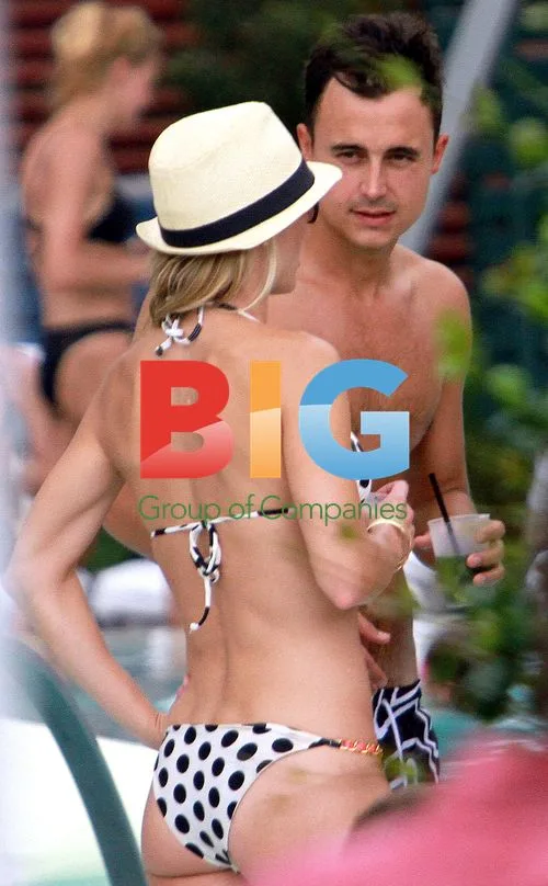 Musician Joe King relaxes poolside in Miami
