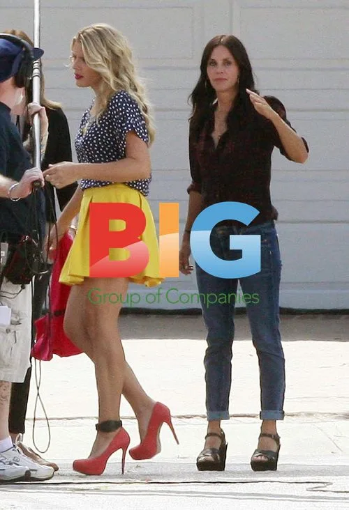 Courteney Cox and Busy Phillips on Cougar Town set