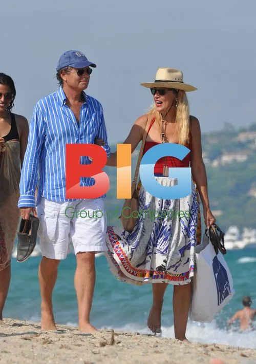 Jerry Hall and Warwick Hemsley in St Tropez