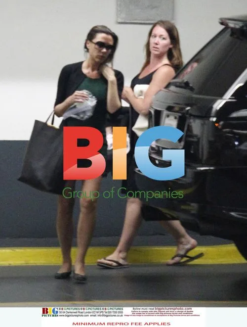 Victoria Beckham with baby Harper