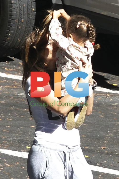 Jennifer Lopez with twins on music video set