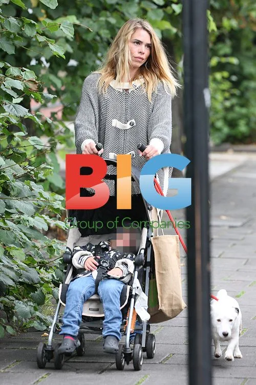 Billie Piper with son and dog in London
