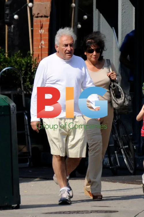 Dominique Strauss-Kahn and Anne Sinclair go for a walk