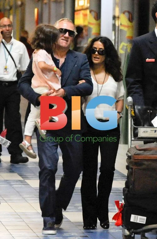 Pinault Family Arrives in Paris