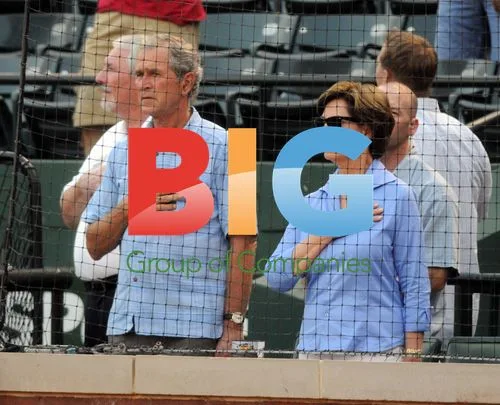 George H.W. Bush and Laura at Baseball Game