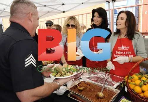 Celebrities Serve Food to Police and Fire Dept