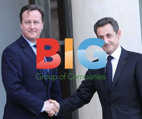 Sarkozy Greets Cameron at Elysee Palace