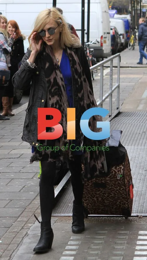 Fearne Cotton Leaves Radio One with Boyfriend