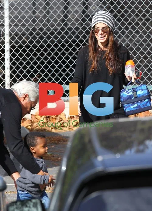 Sandra Bullock Drops Off Son Louis to School
