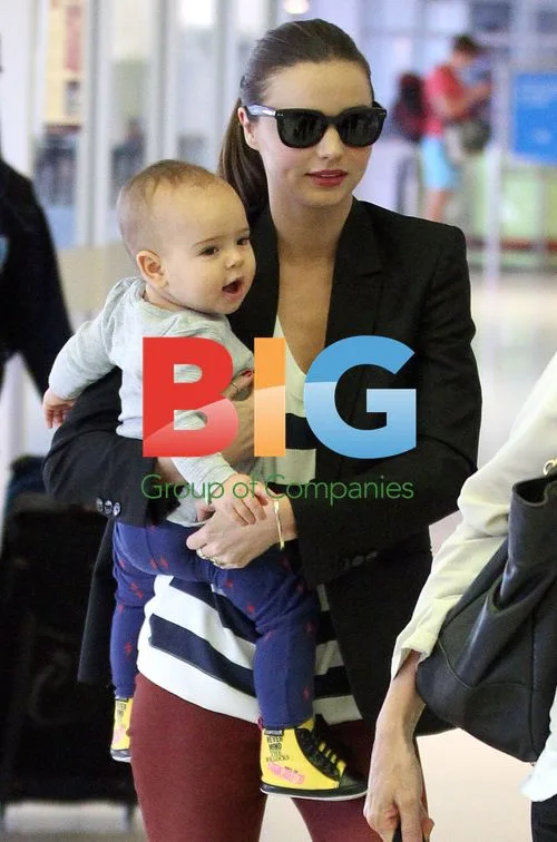Miranda Kerr Spotted Leaving Sydney with Baby