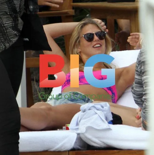 Alexandra Richards Relaxes by Pool in Miami