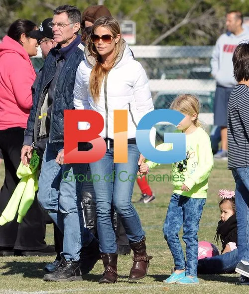 Denise Richards Cheers on Daughter at Football Match