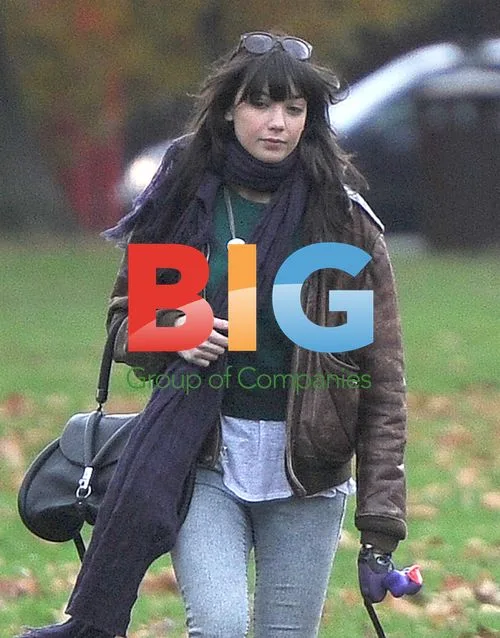 Daisy Lowe Walks Dog in Primrose Park