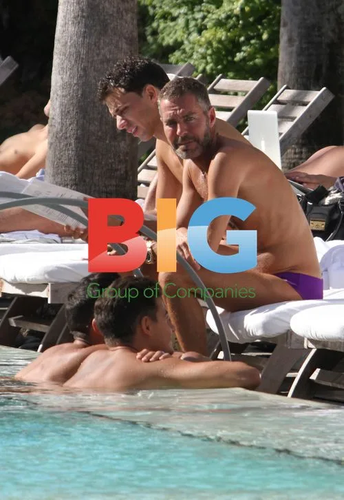 Dean Caten Relaxes by Pool in Miami
